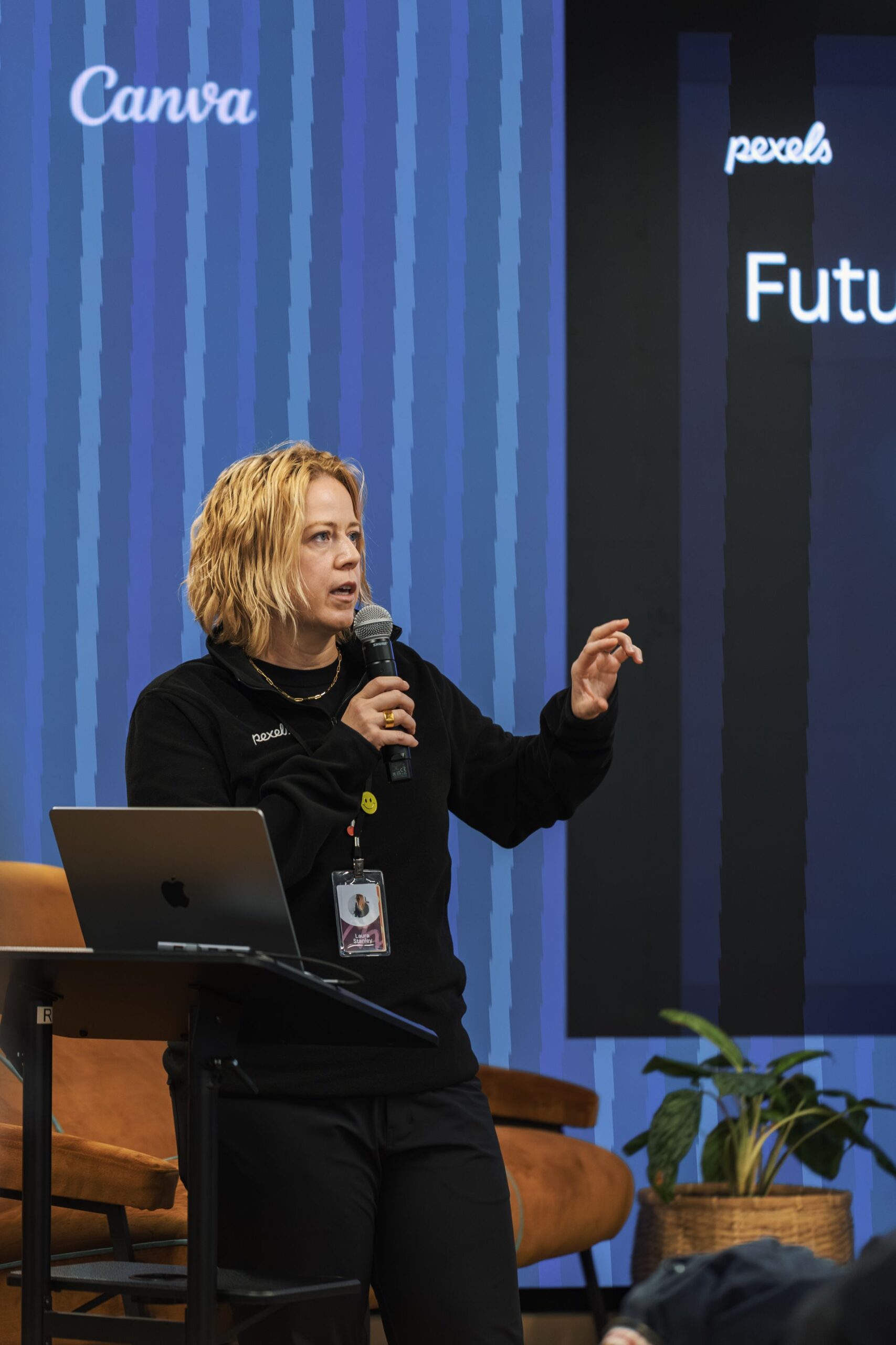 Speaker presenting at a technology conference